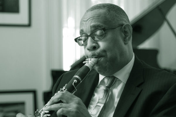 Dr. Michael White playing the clarinet.